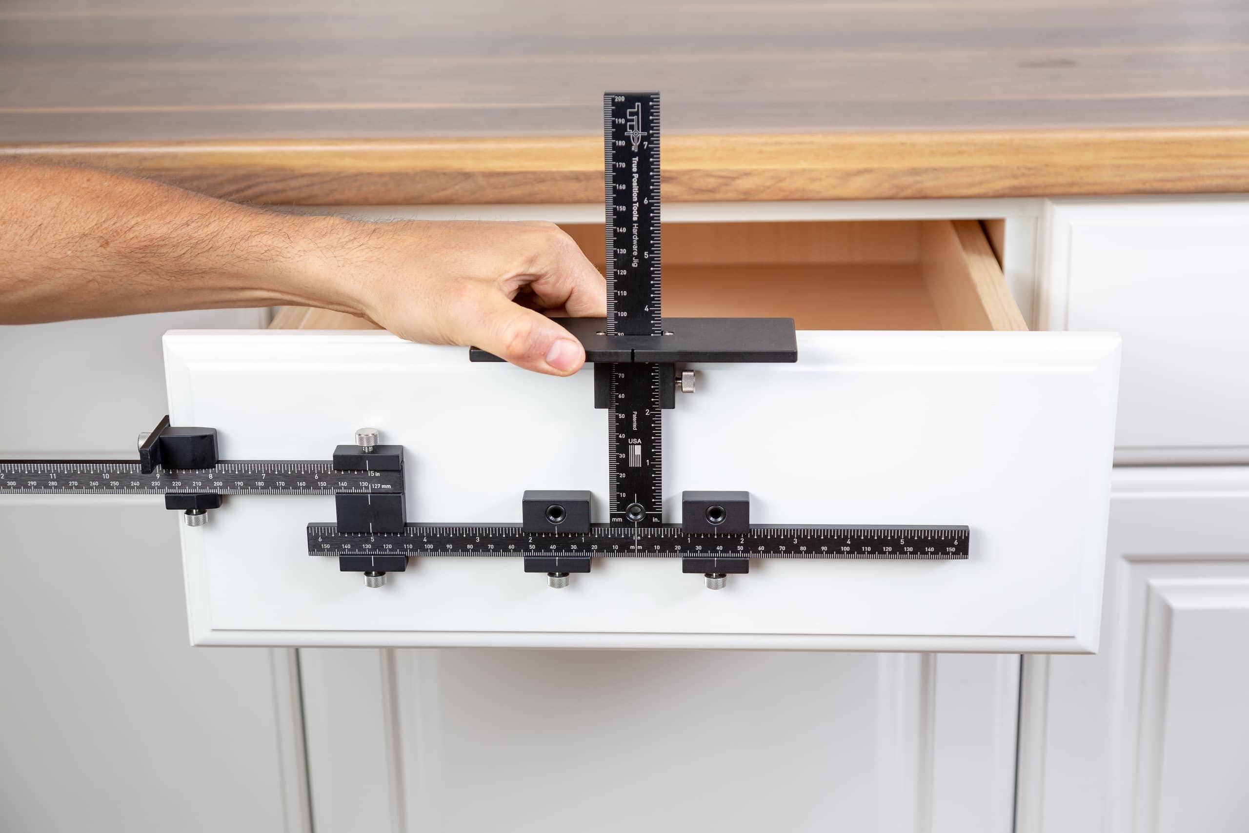 Premium Cabinet Hardware Jig, includes Extension Set, Extended Ruler Attachment, and Carrying Case.